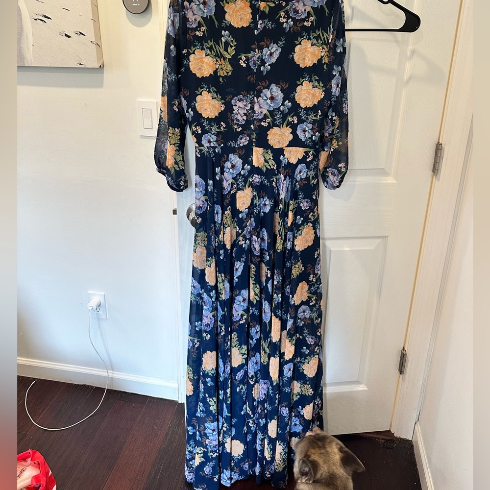 Dark blue dress, zipper on the back. Worn couple of times